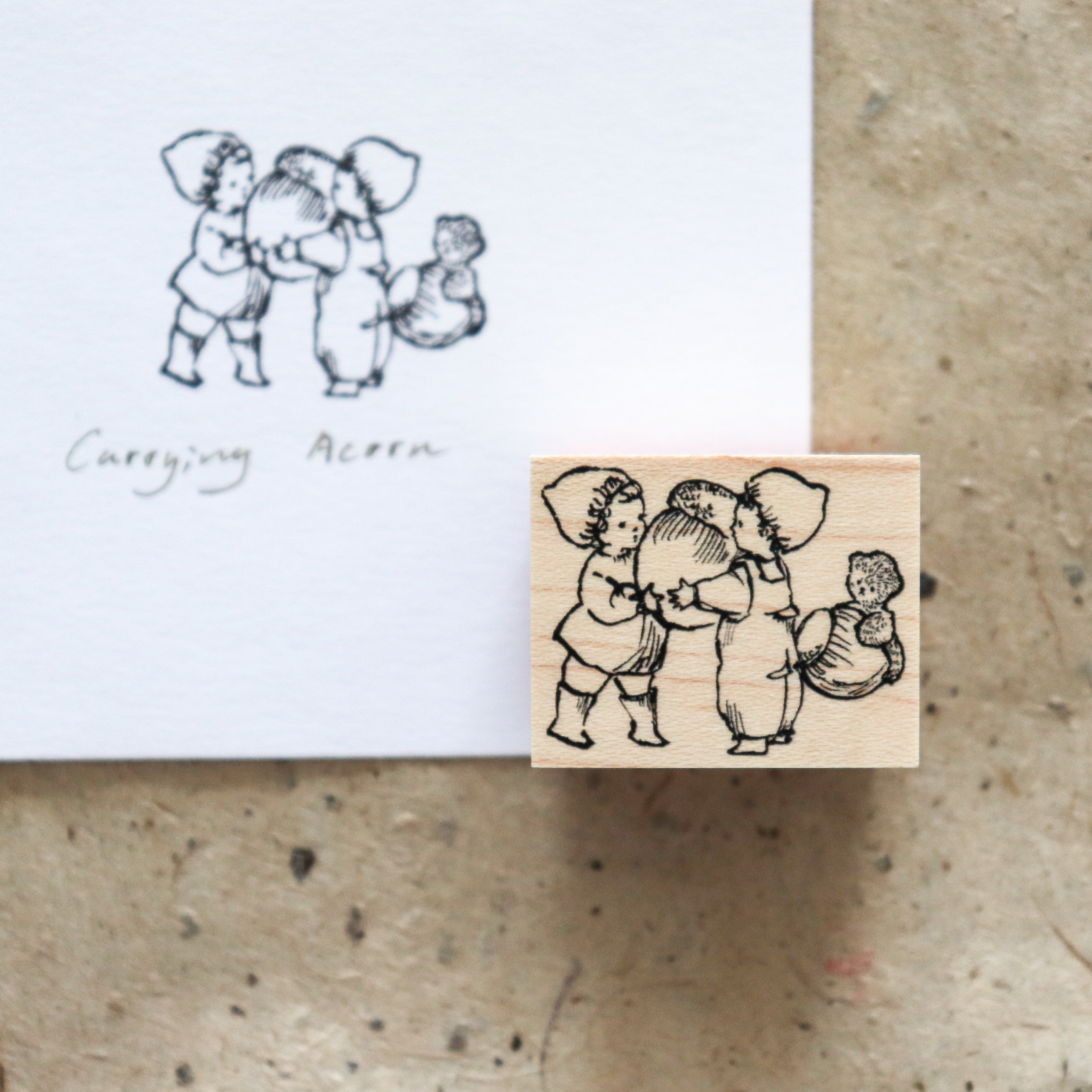 Krimgen -Wood Rubber Stamp - Carrying Acorn