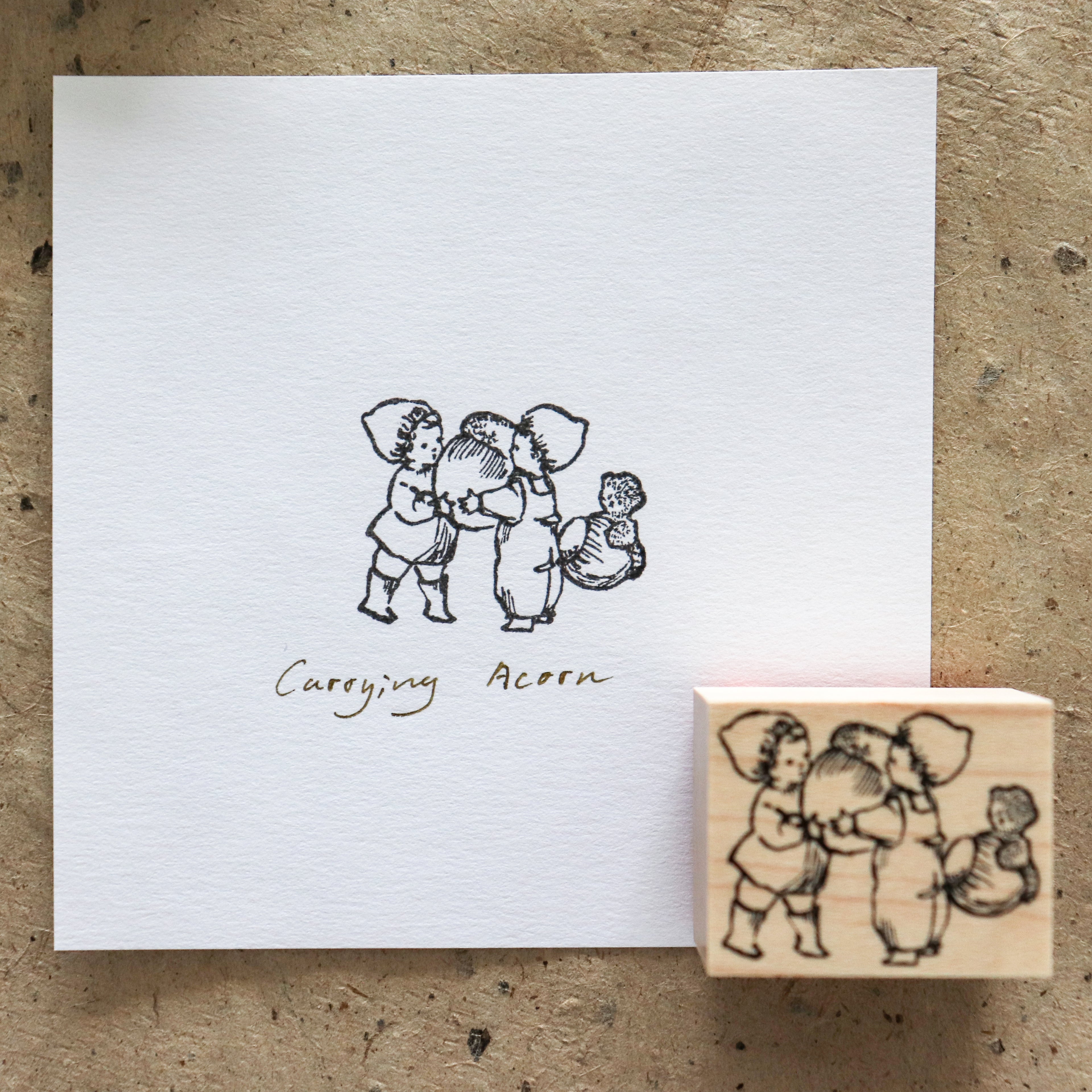 Krimgen -Wood Rubber Stamp - Carrying Acorn