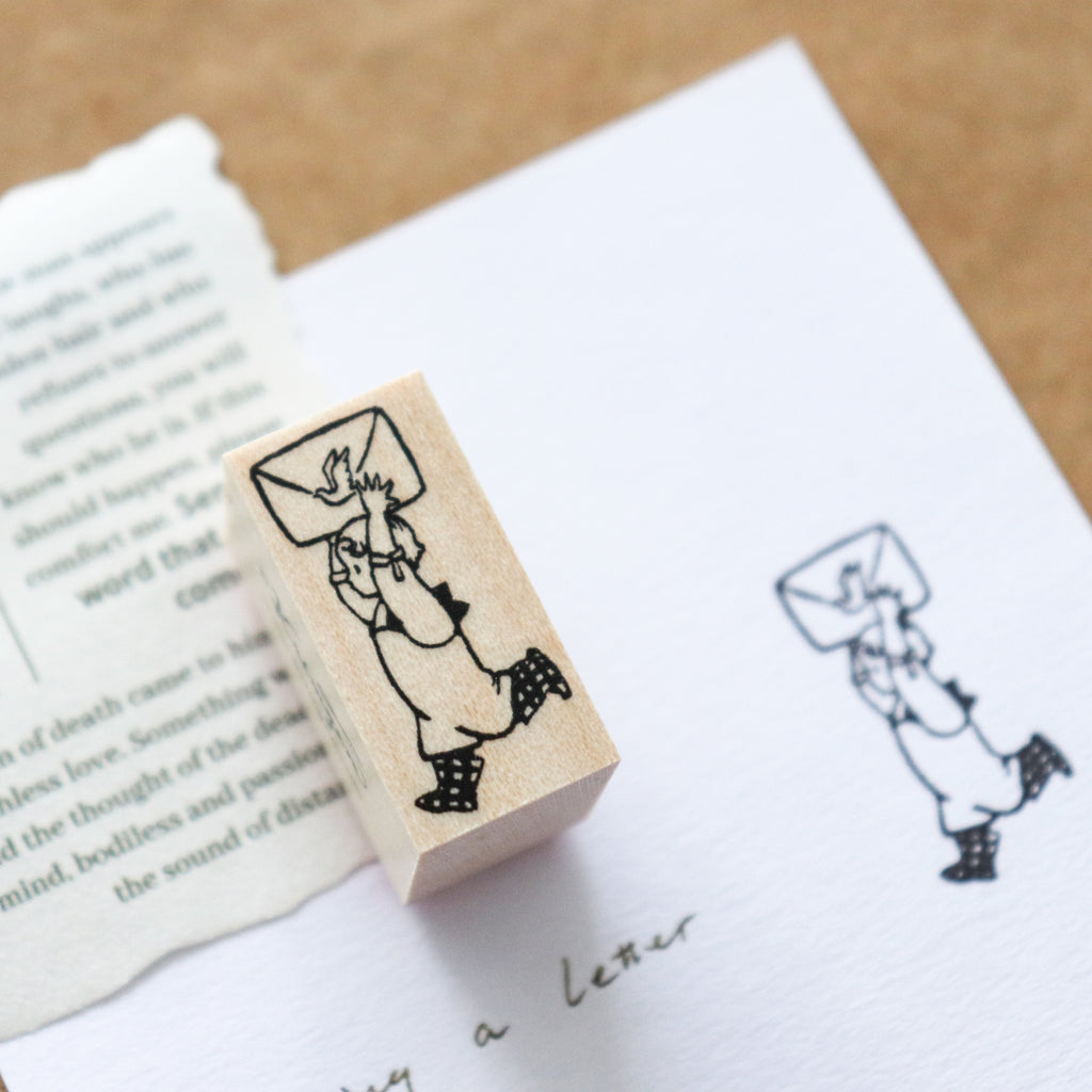 Krimgen -Wood Rubber Stamp - Carrying a Letter